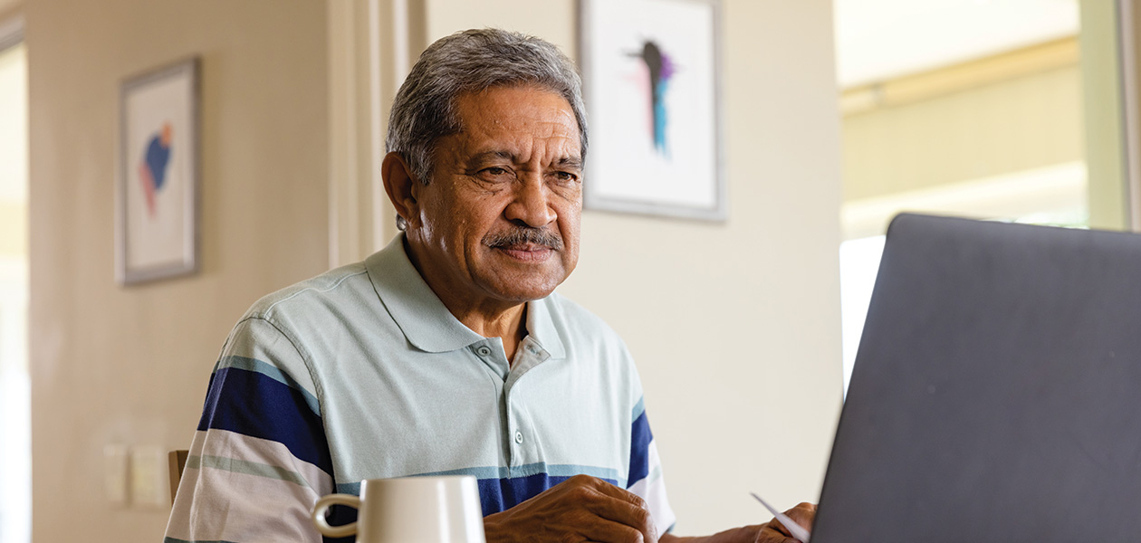 man using a laptop computer at home 2026 03 25 02 35 44 utc