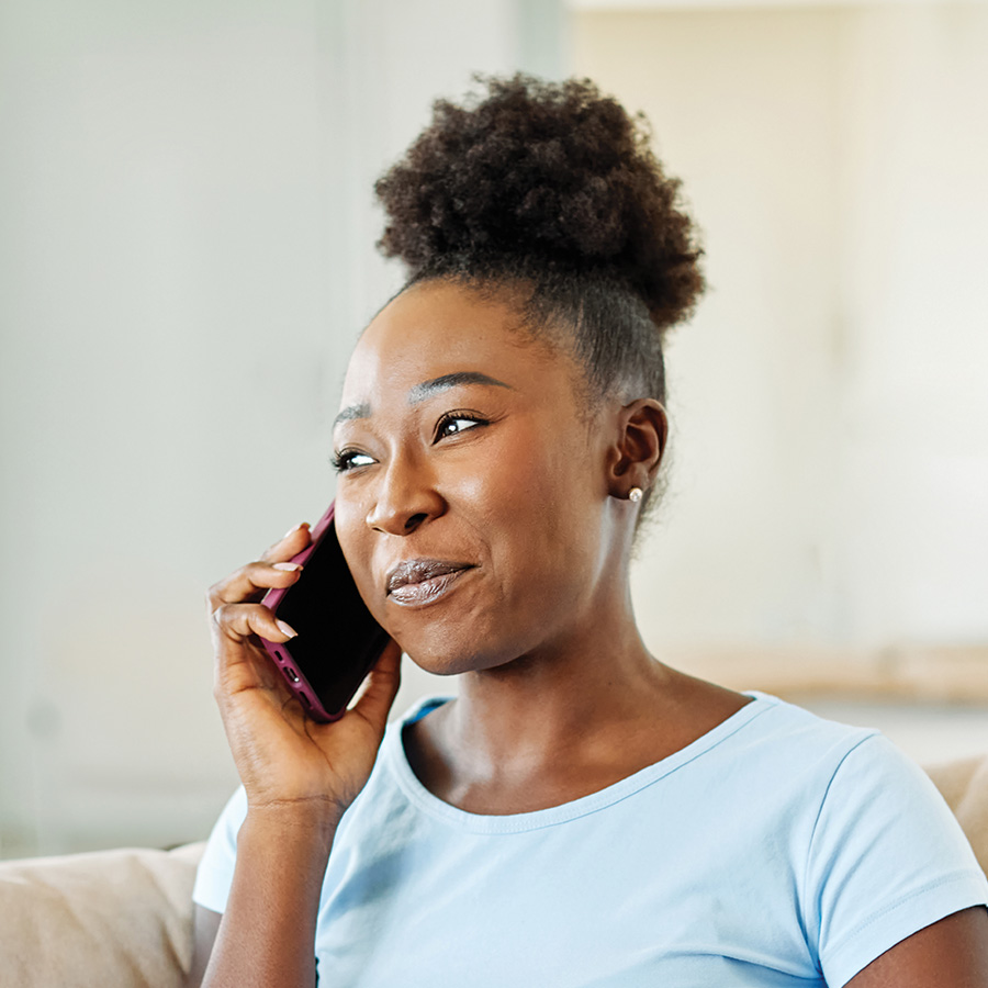 young woman talking on her mobile phone at home 2026 05 06 16 13 27 utc