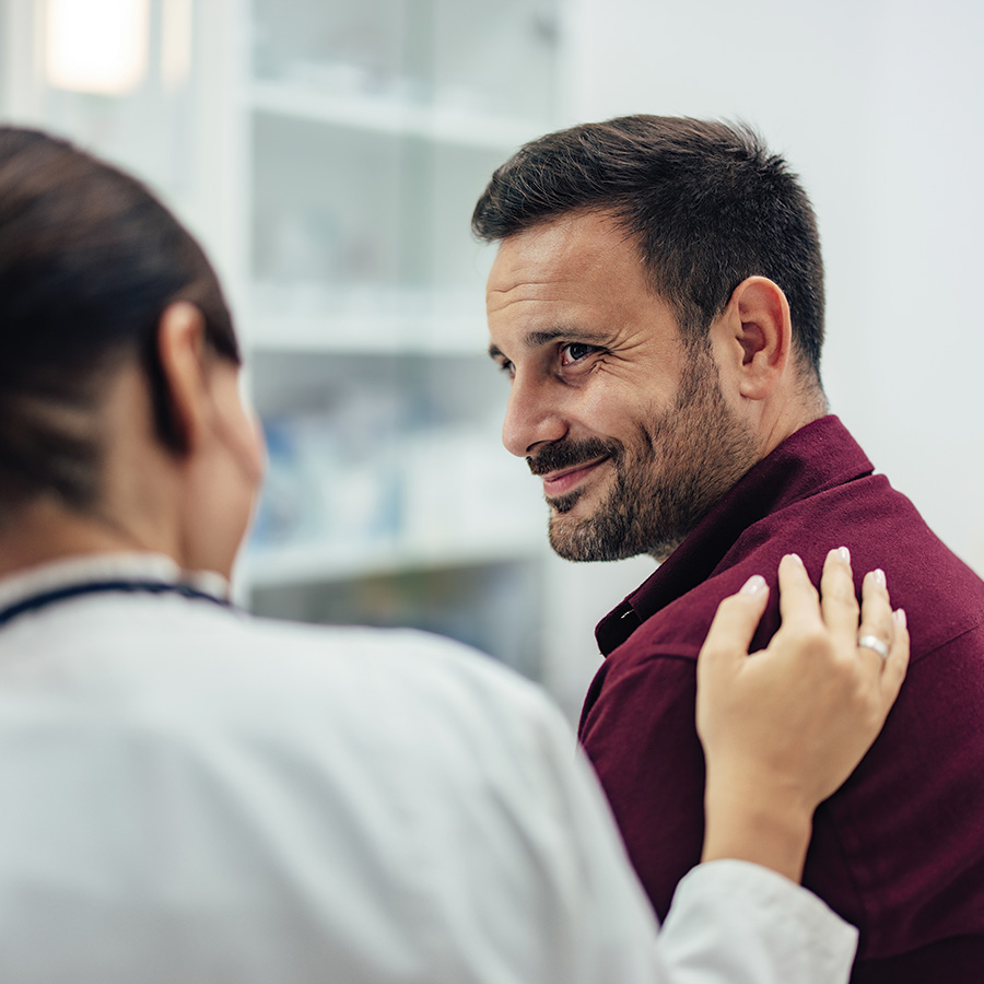 doctor comforting male patient during visit in mod 2026 03 20 04 15 54 utc