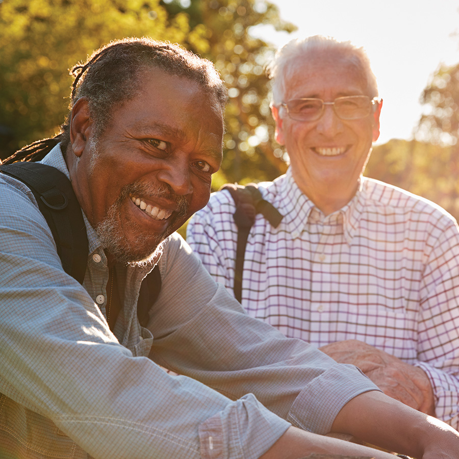 portrait of two male senior friends hiking in coun 2026 03 10 03 21 04 utc