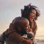 black couple travel and beach fun while laughing 2022 12 12 17 10 39 utc