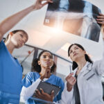 shot of a group of doctors discussing the results 2026 01 09 11 15 00 utc
